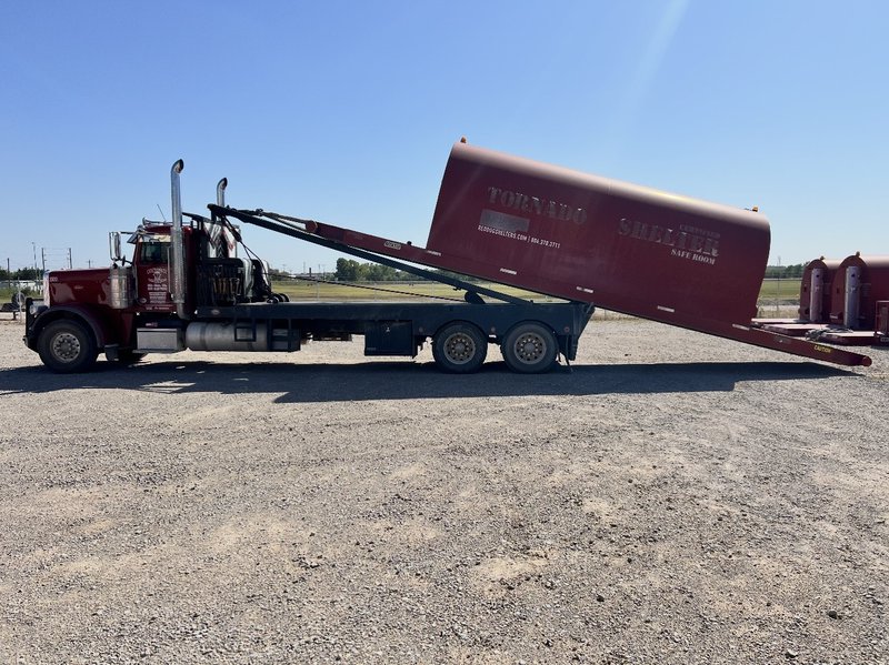Portable storm shelters being delivered