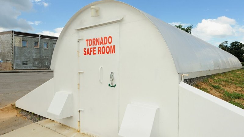 A common community tornado shelter functioning as designated On-Site Safety Stations.