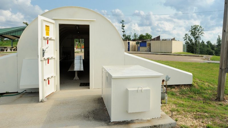 A standard disaster shelter compared against heavy-duty Extreme storm shelters.