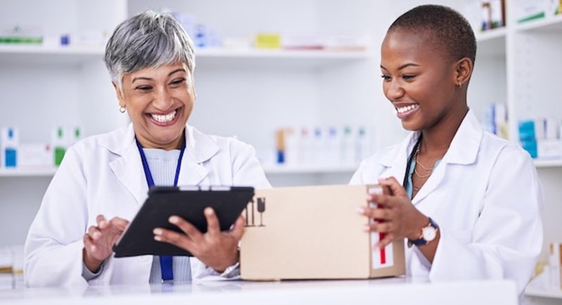 pharmacists checking out the package
