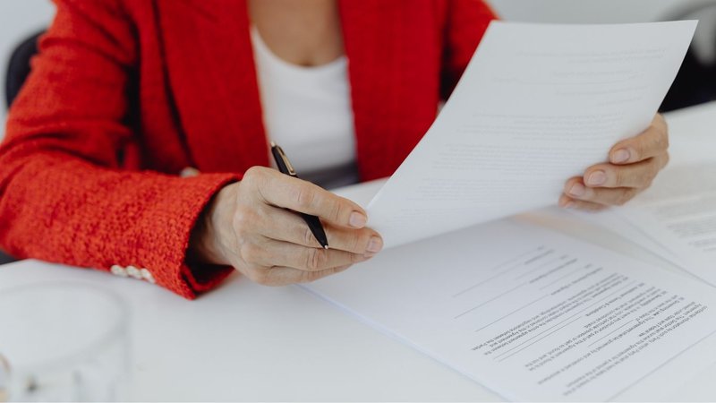 An FDA representative reviewing compliance records within healthcare supply chain software.