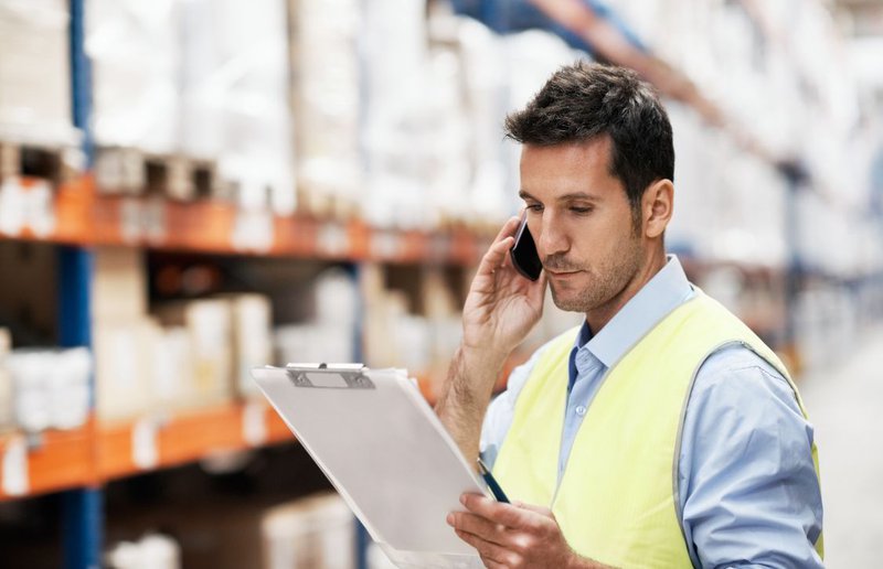 warehouse manager checking if there are any mis-shipment