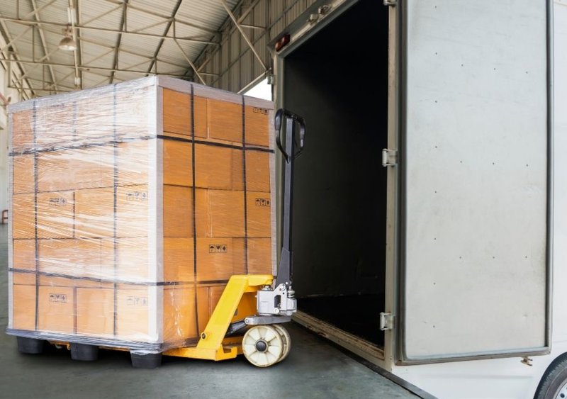 warehouse and shipping management, loading boxes from warehouse to a truck