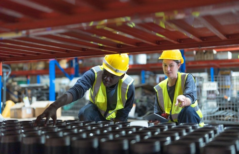 warehouse staff managing beverage logistics