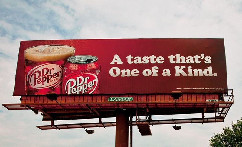 Large Dr Pepper billboard with simple product messaging and bold brand creative.