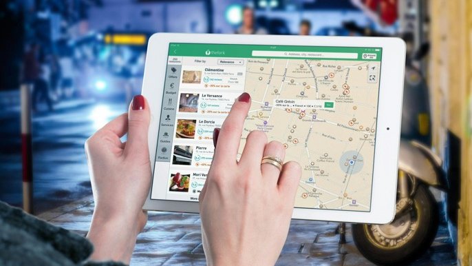 A map search using a tablet to evaluate billboard inventory access by location