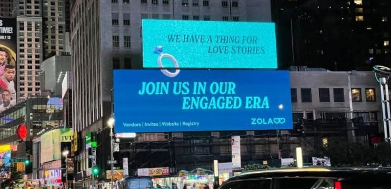A digital billboard displaying a clear, bold message in a high-traffic city center location.