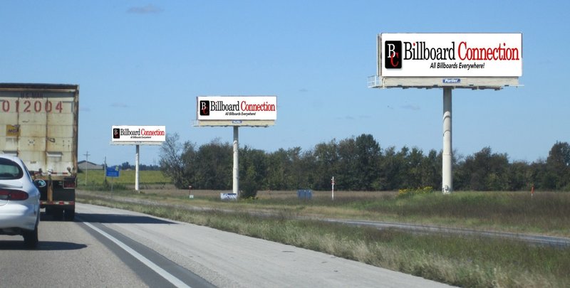 Billboards along the side of a highway.