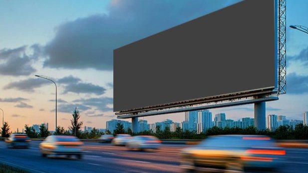 A large roadside billboard placement for advertising on GA-400 near commuter traffic