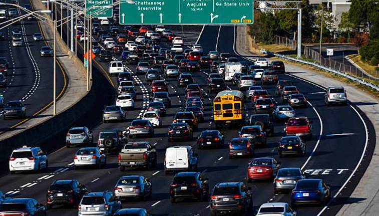 Heavy Atlanta highway traffic illustrating the high-impression corridors that influence how much does a billboard cost in major metro markets.