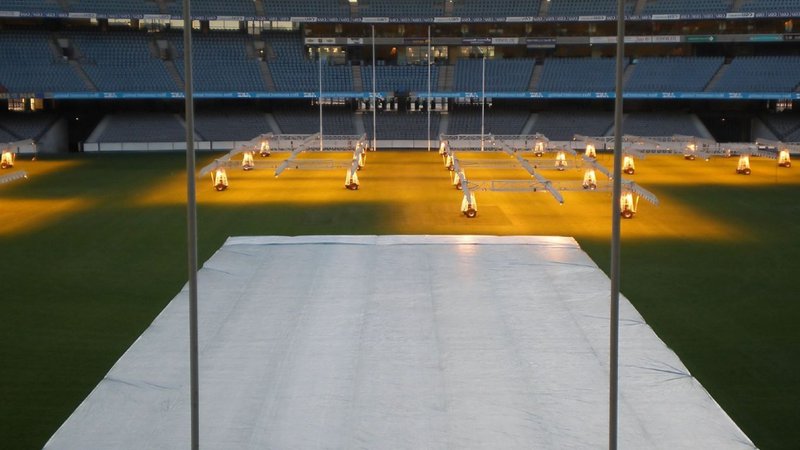 football pitch covers on a field helping grass grow