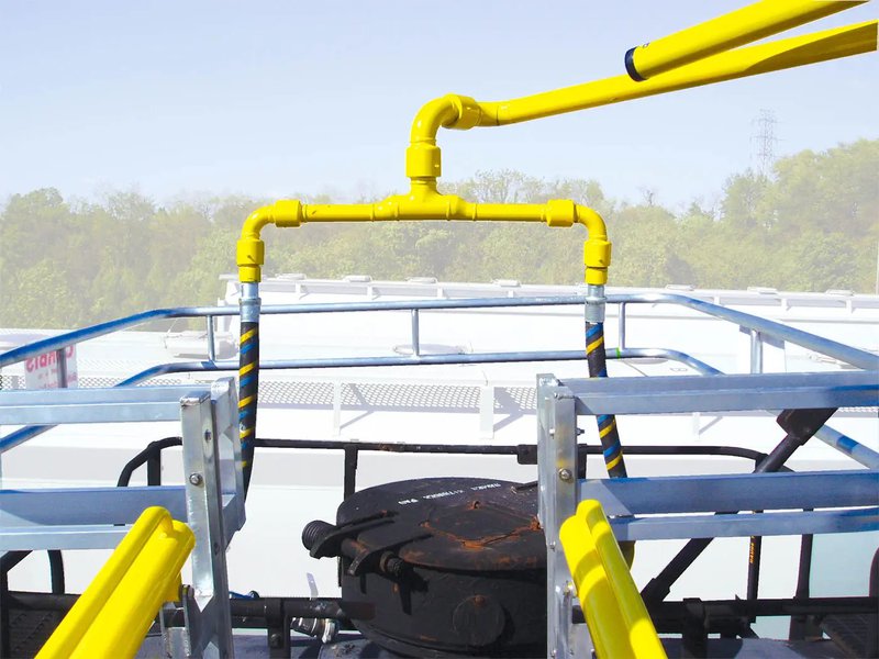 A top loading arm with a cage for loading railcars