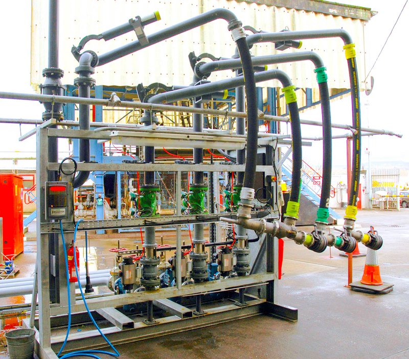 A liquid bottom loading system