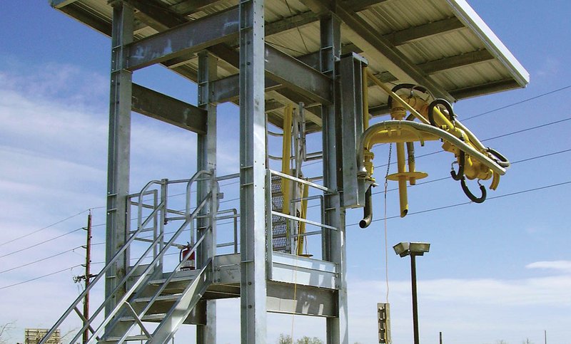A mounted top loading arm at an industrial facility