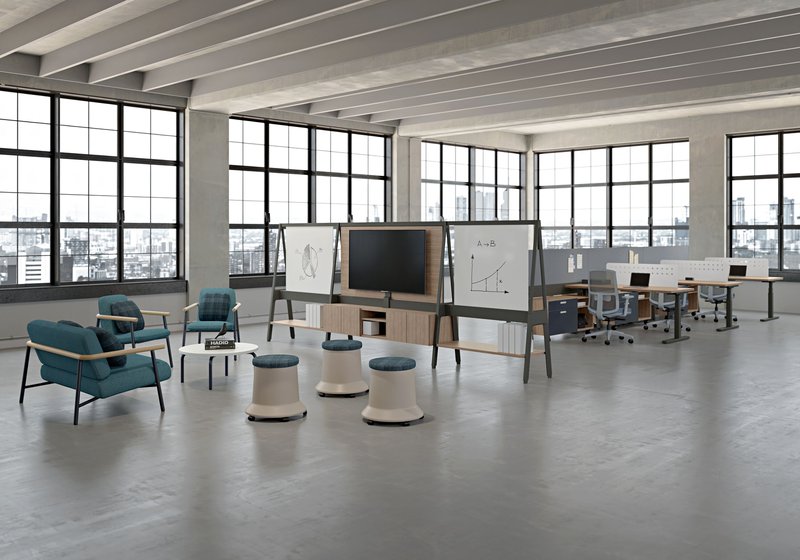 This photo showcases an office space with ergonomic furniture for desks and collaborative areas