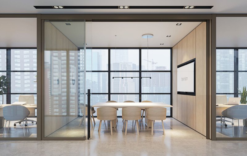 This photo displays a meeting room designed with demountable walls