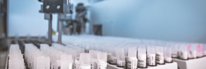 A photo showing hundreds of vials in a workplace that practices cost effective laboratory testing.