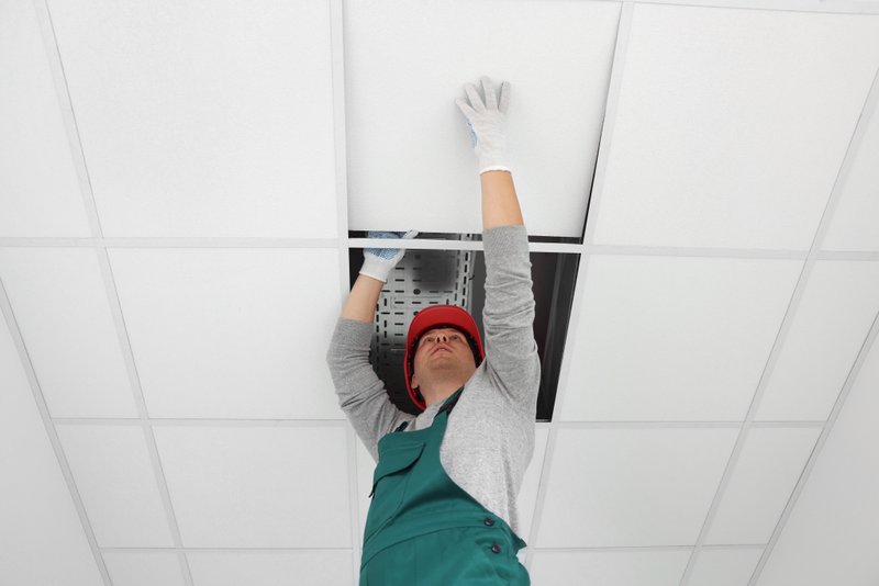 This photo shows a specialized cleaning service addressing hard-to-reach areas that in-house staff might miss during standard maintenance.