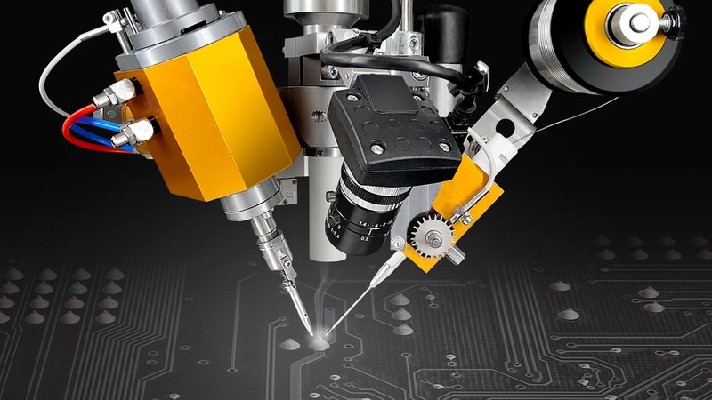 The image shows a zoomed in shot of an automated soldering head from mta robotics.