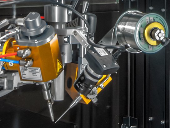 The image shows a robotic soldering equipment from mta robotics.