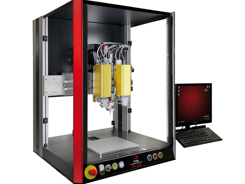 This is a TR300 dispensing table-top robot for high-precision automated fluid dispensing