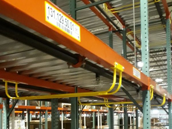 The image shows the a sprinkler guard in a facility.