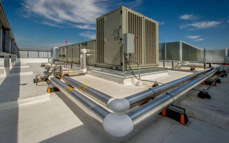 Rooftop commercial HVAC system with large ventilation units