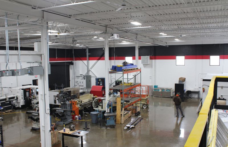 direct-fired radiant infrared heating system installed in a warehouse as an alternative to a boiler installation