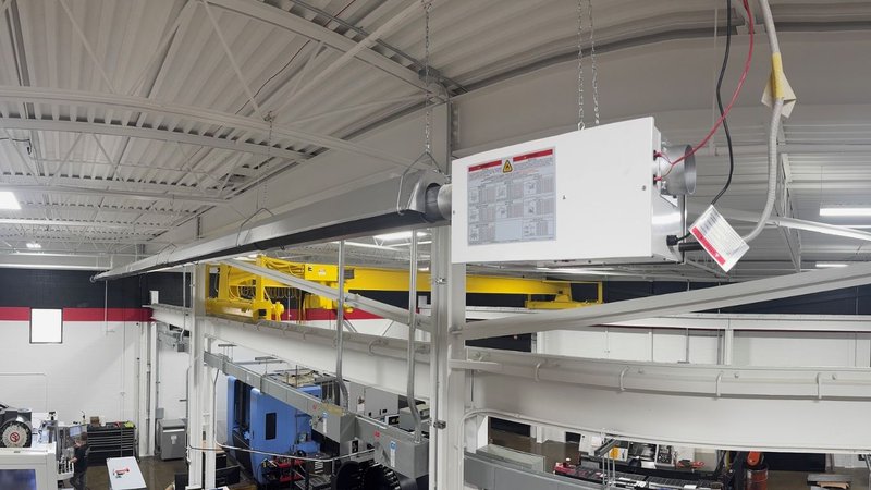 A manufacturing facility with industrial machinery optimized via a Radiator Sizing Chart.