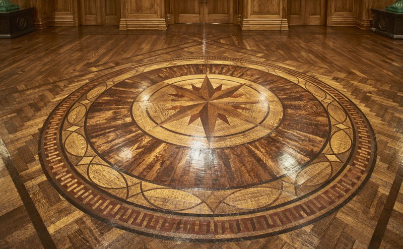 This photo showcases a hardwood flooring with an intricate design
