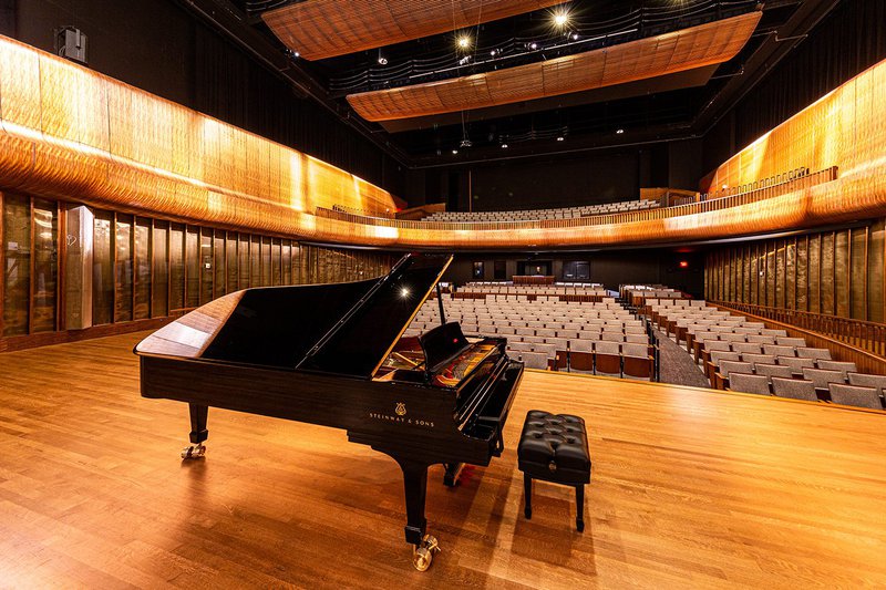 This photo shows an auditorium that uses scratch resistant white oak flooring