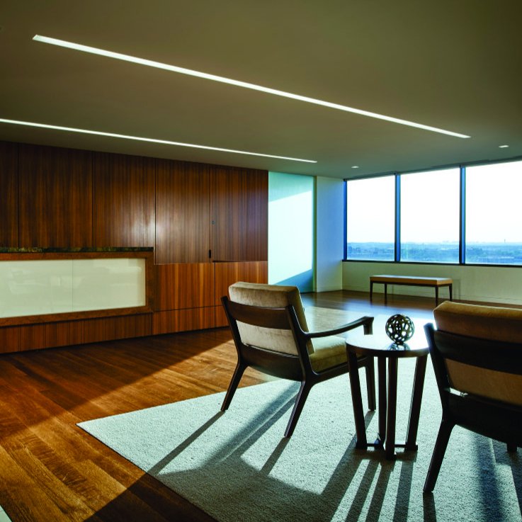The image shows rift cut white Oak flooring being used in American Beacon. Also found are a few tables, chairs, and carpets to decorate the place. The image shows rift cut white Oak flooring being used in American Beacon. Also found are a few tables, chairs, and carpets to decorate the place.