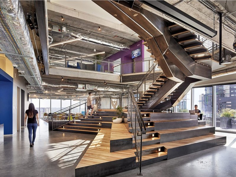 Monumental stair design that uses Pecan/Hickory