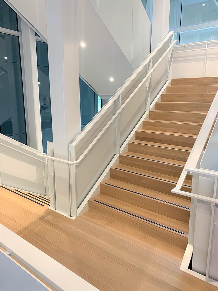 This image shows rift white oak treads being used for stairs at a hospital