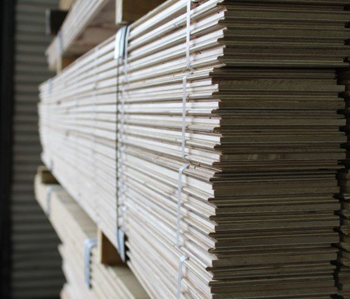 An image showing stacks of engineered flooring.