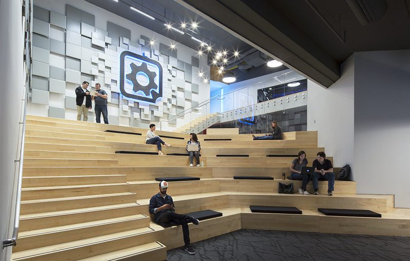 This photo features integrated seating in stairs at an office space
