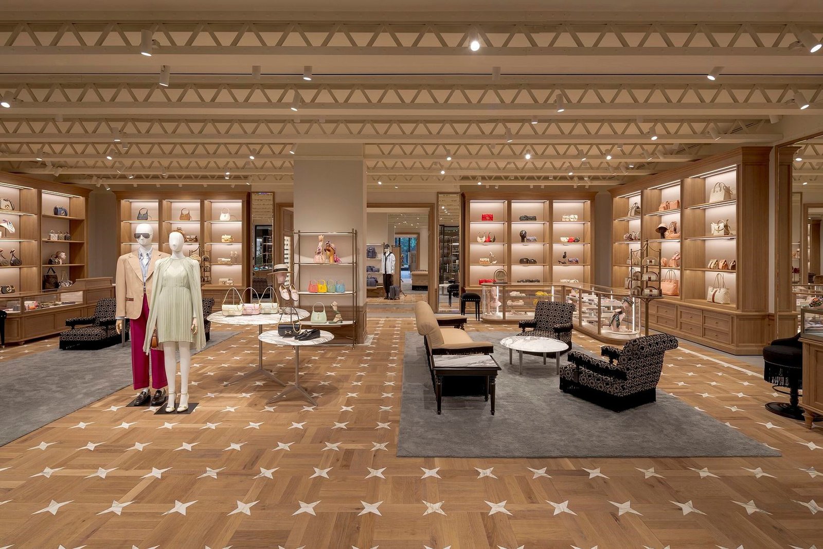 The image shows marble pattern wood flooring used in a fashion store.