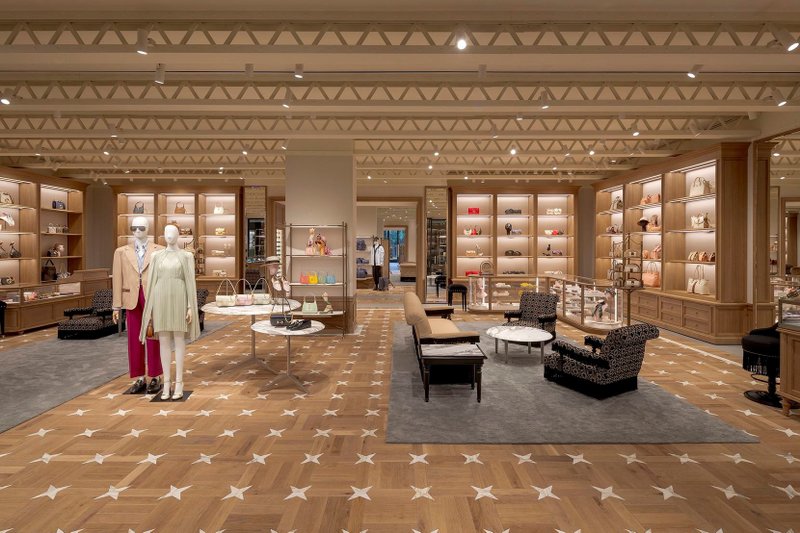This photo features mixed media integration for flooring using white oak and marble