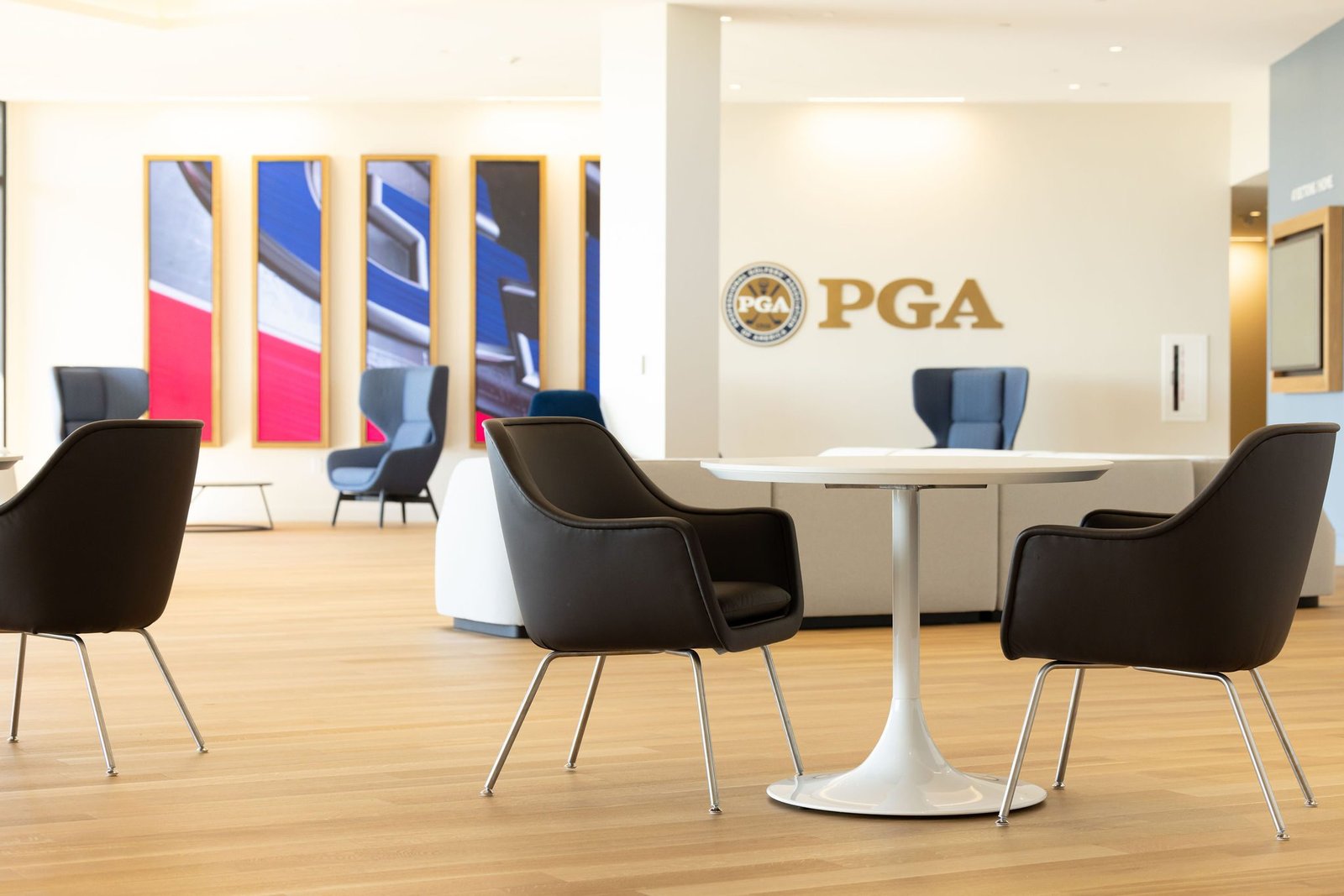 an office reception desk with white oak flooring an office reception desk with white oak flooring