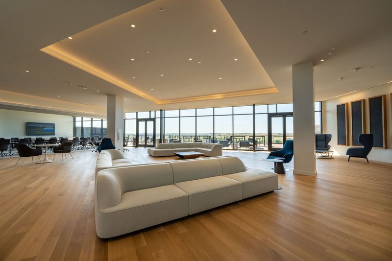 The image shows usage of oak hardwood flooring in a corporate office