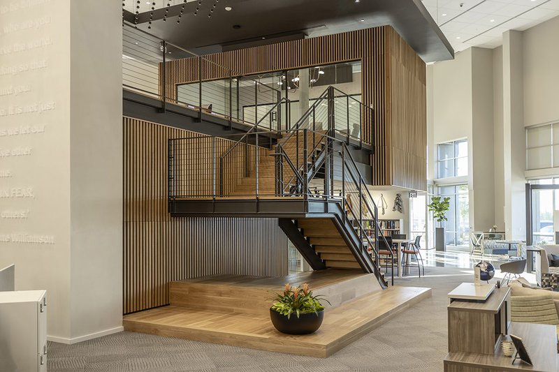 The image shows total office solutions, which uses live sawn white oak treads and risers