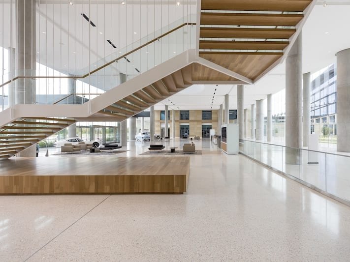 This photo features an expertly engineered statement staircase that uses rift cut white oak