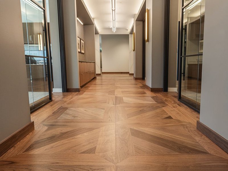 This photo showcases a customized hardwood flooring in an office