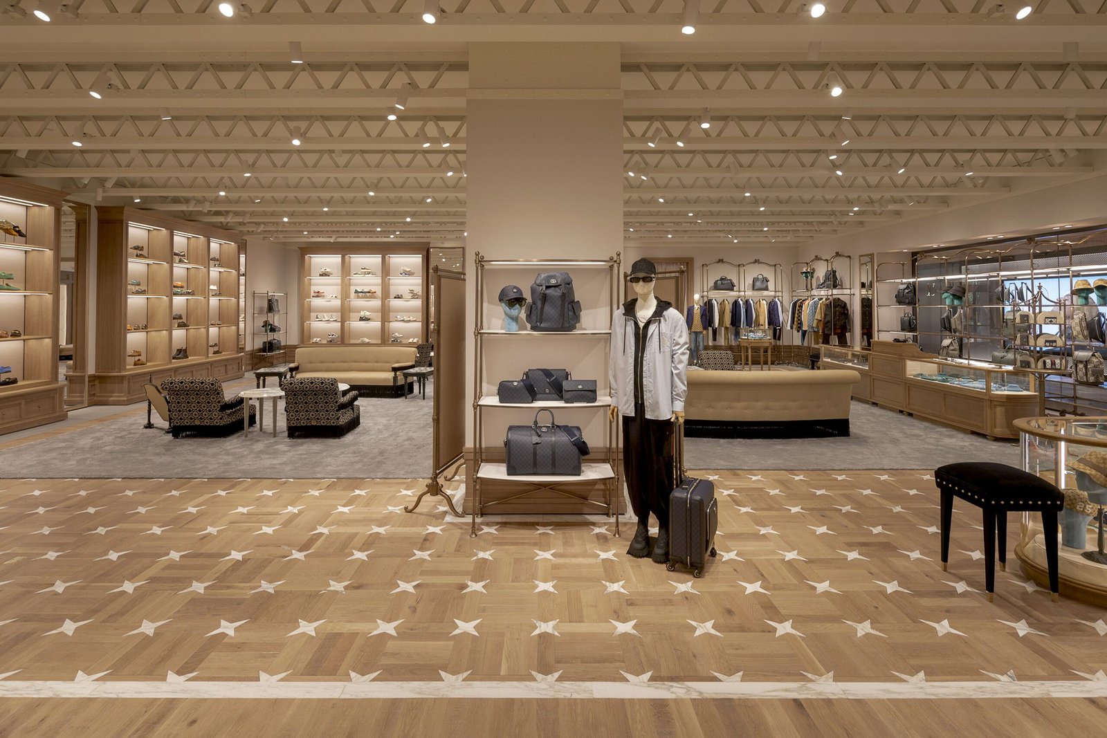 This photo showcases a retail store with white oak wood flooring with a customized design This photo showcases a retail store with white oak wood flooring with a customized design