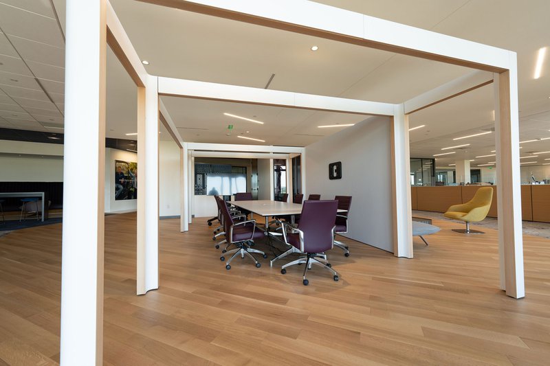 This photo shows a meeting room using white oak wood flooring