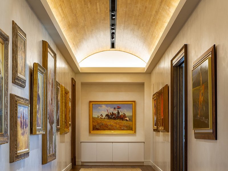 The image shows a corporate office in Dallas Texas that uses a wood plank ceiling The image shows a corporate office in Dallas Texas that uses a wood plank ceiling