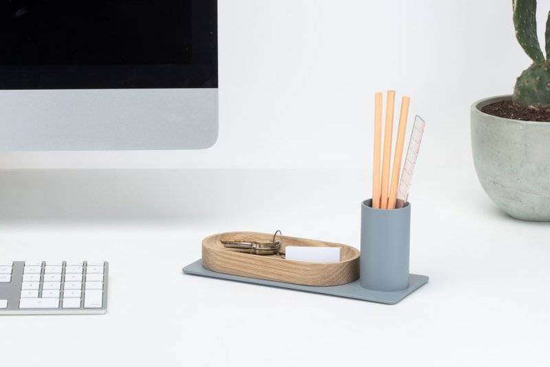 The image shows one of the many office accessories offered by LightCorp, namely their Cody desktop organizer