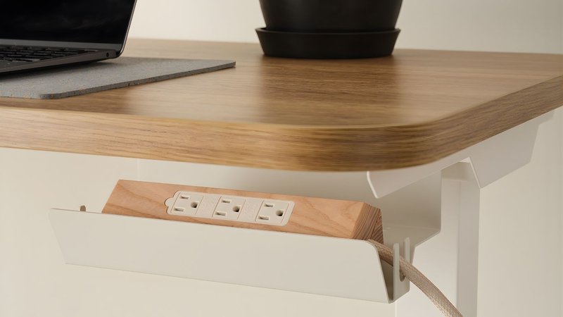This photo showcases commercial-grade power solutions for offices: Lola Power Sling