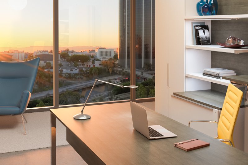 The image shows a workspace that uses the Revo Double Arm from LightCorp.
