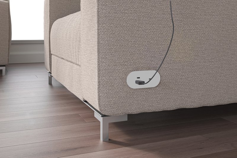 The image shows a recessed outlet from LightCorp that's integrated to a couch.